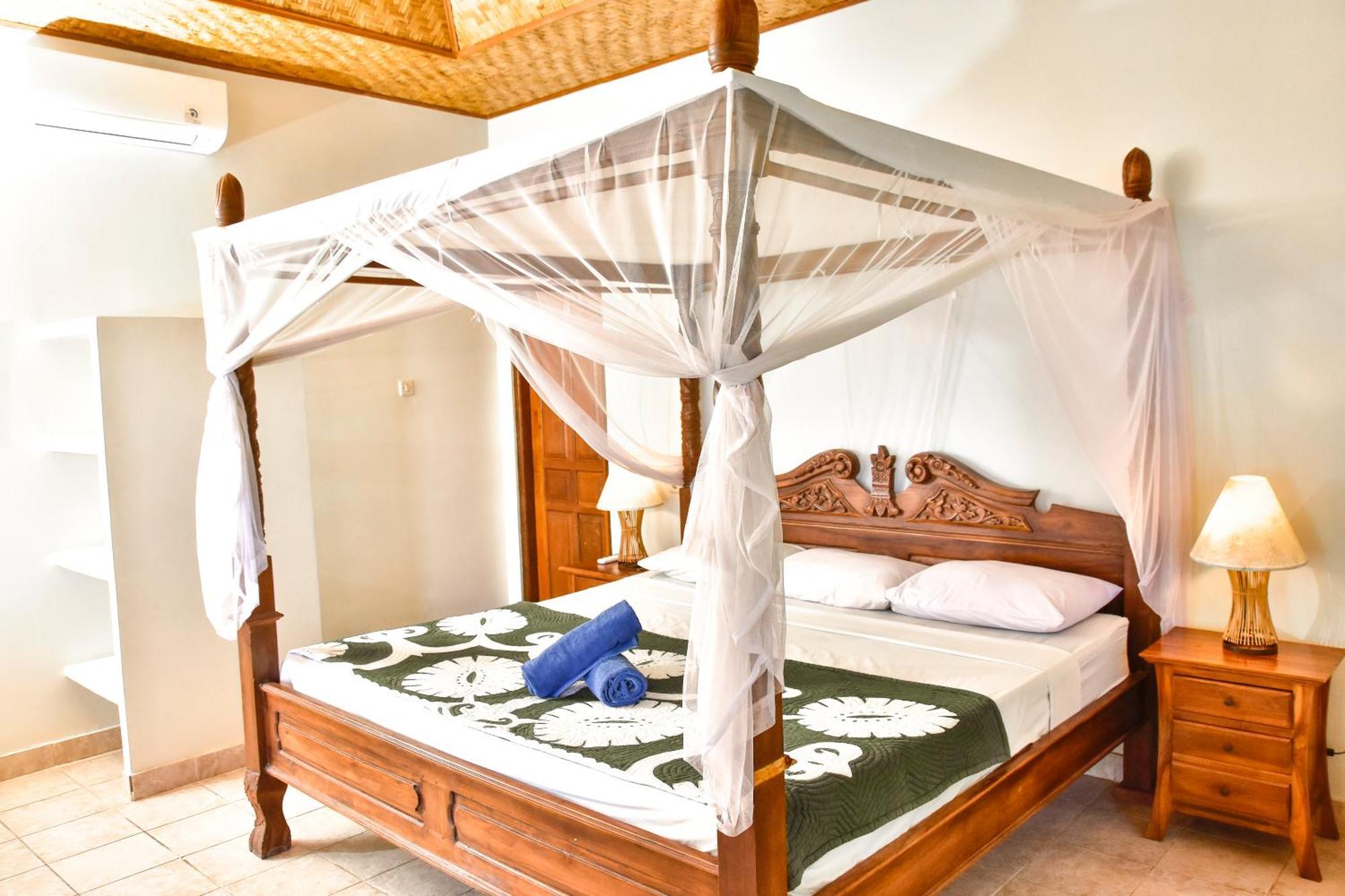 Hotel Ganesha Amed Chambre photo
