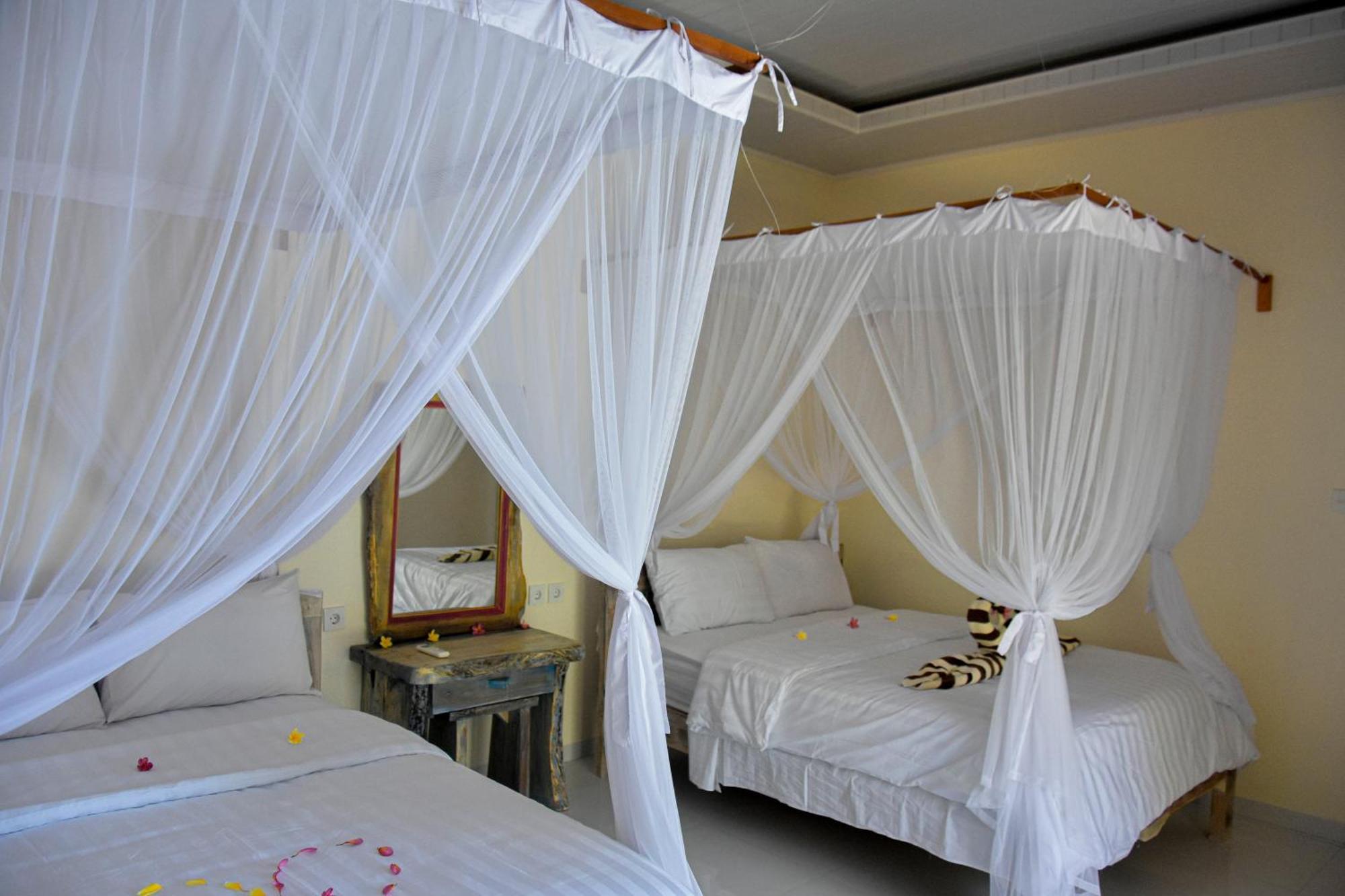 Hotel Ganesha Amed Chambre photo