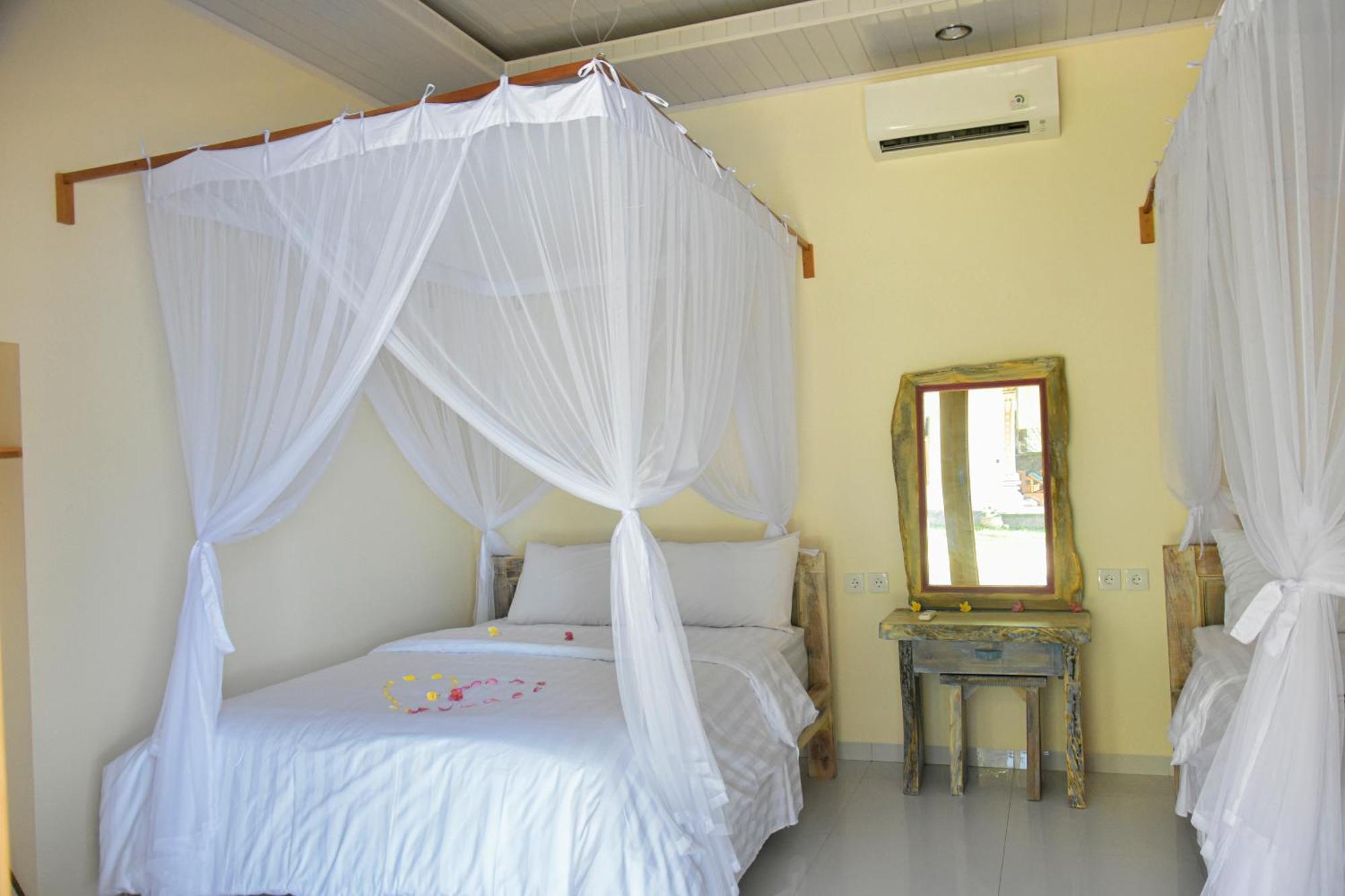 Hotel Ganesha Amed Chambre photo