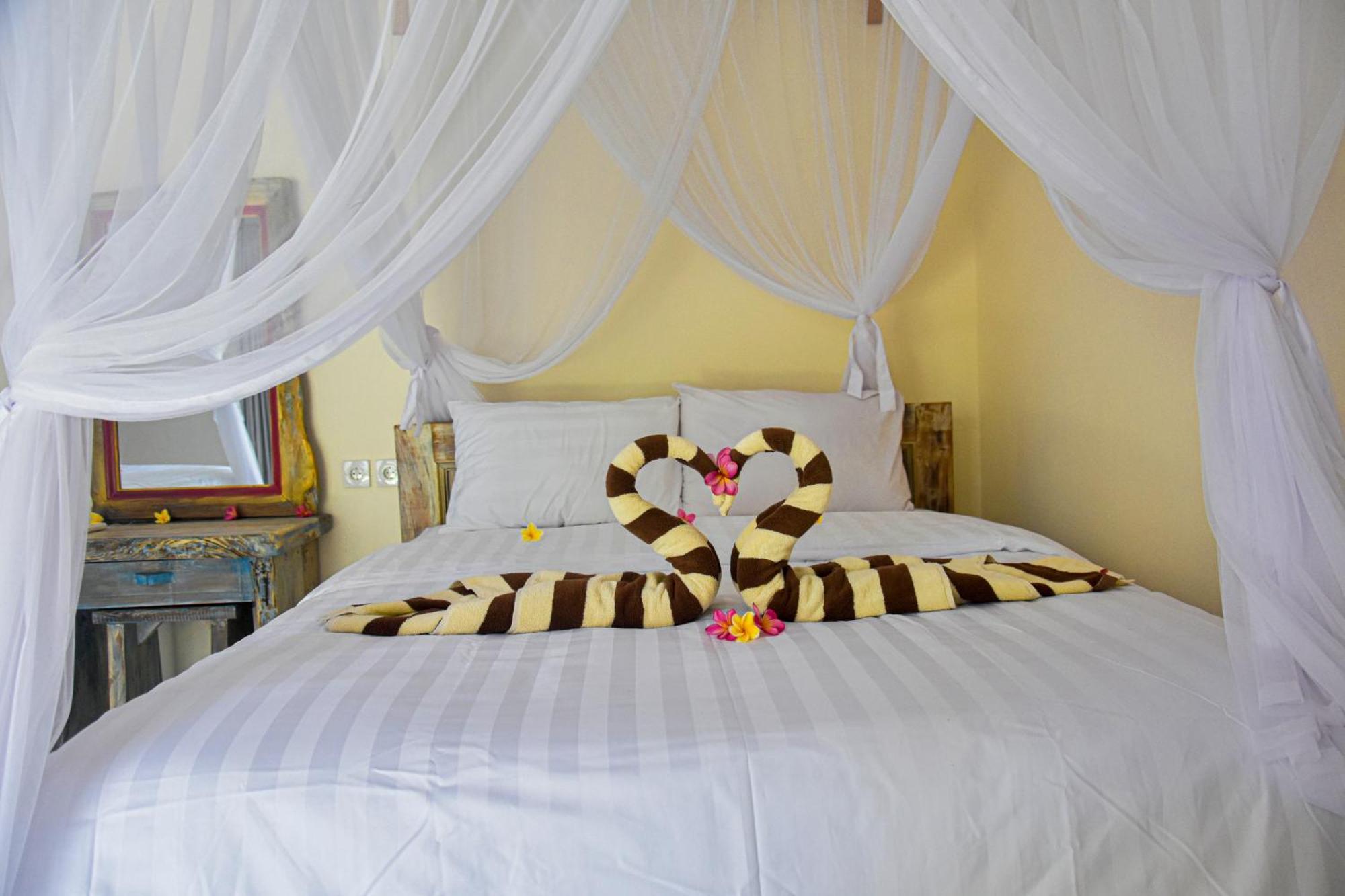Hotel Ganesha Amed Chambre photo